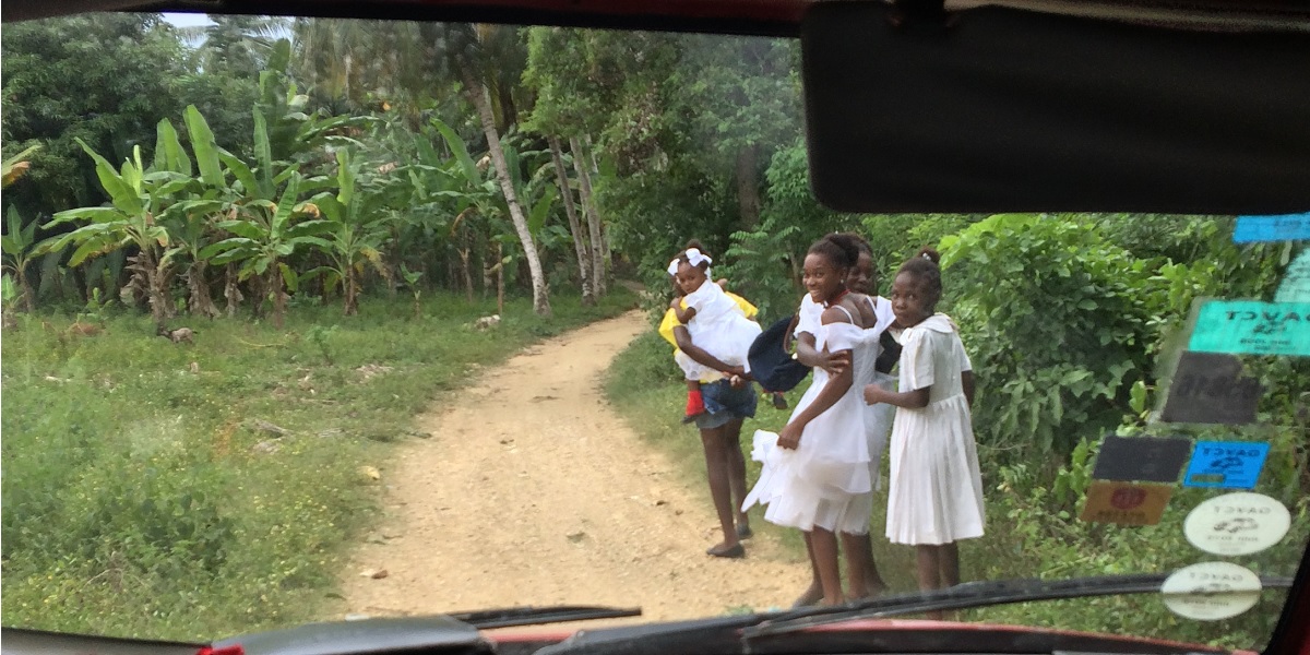 Haitians walking to church